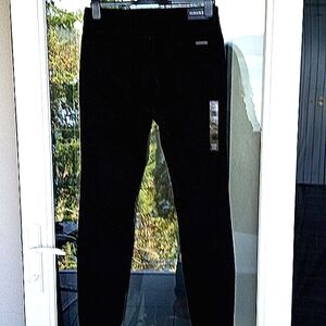 NEW! Calvin Klein black jeans. Unworn, skinny with size tag, see photo.